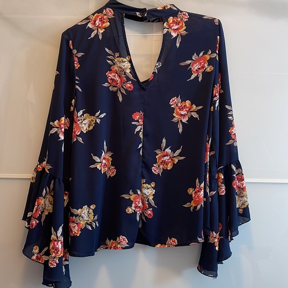 Blue lightweight top with flowers and bell sleeves. - Picture 6 of 6